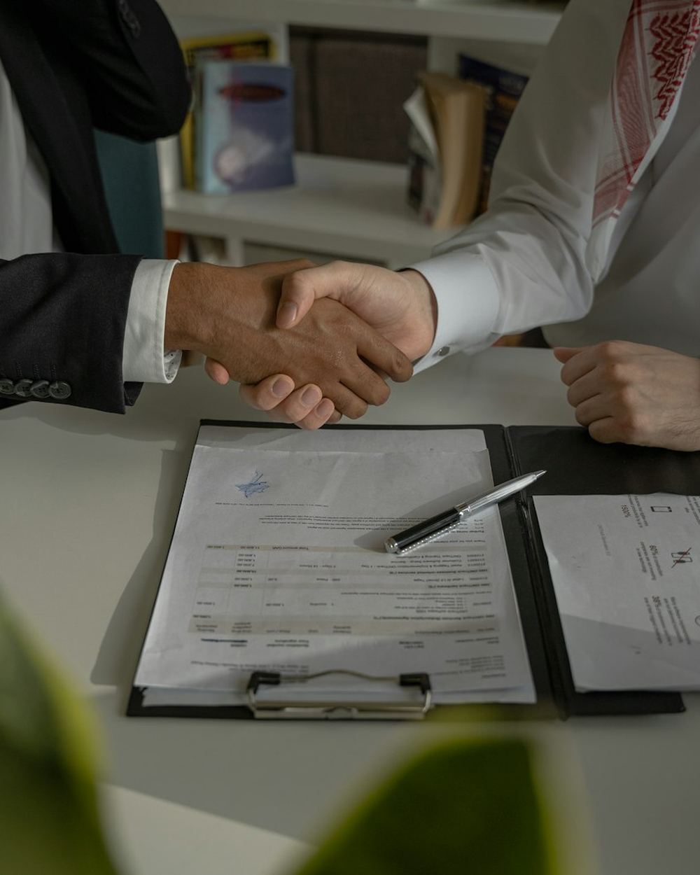 A handshake over signed documents
