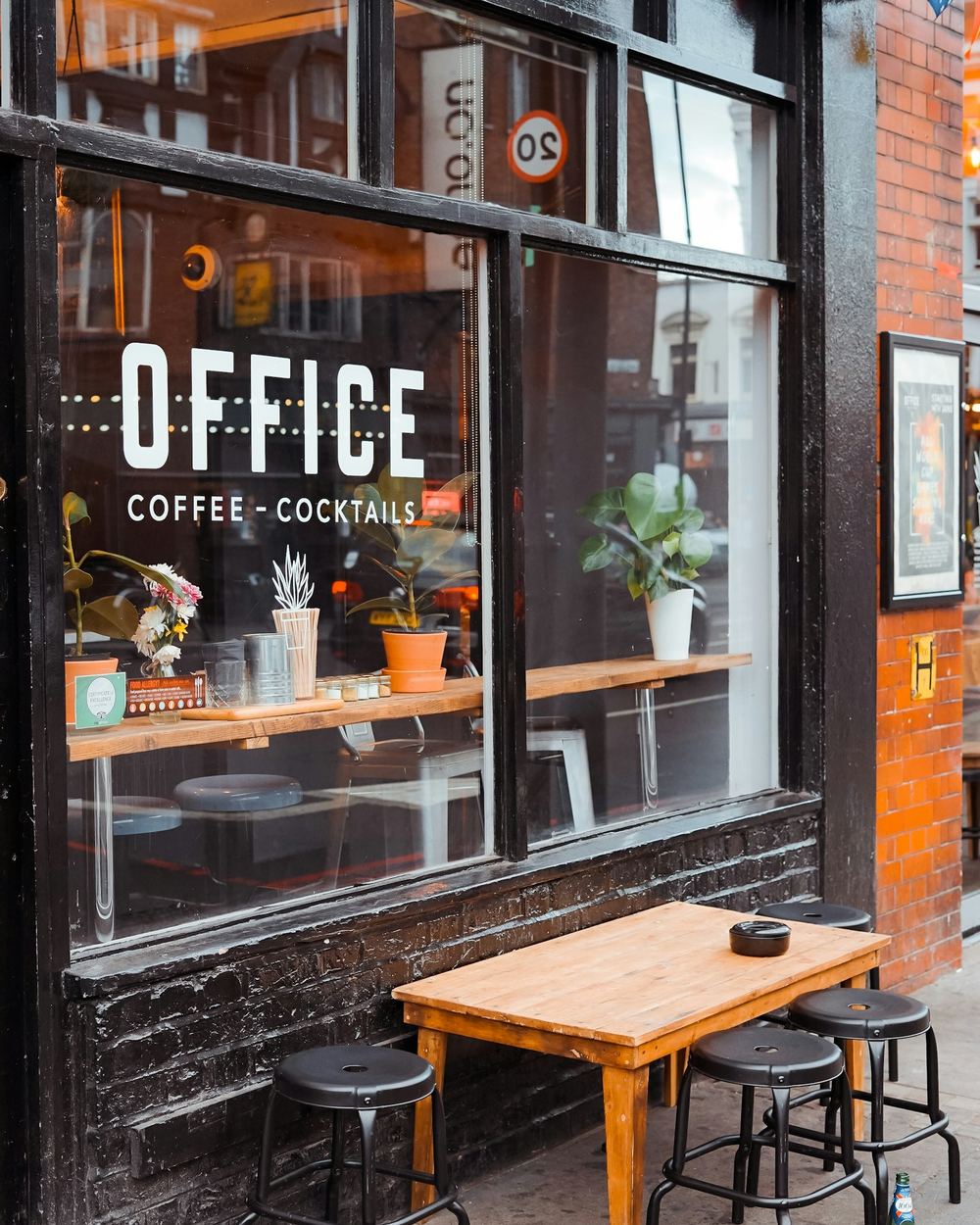 A small storefront with outdoor seating