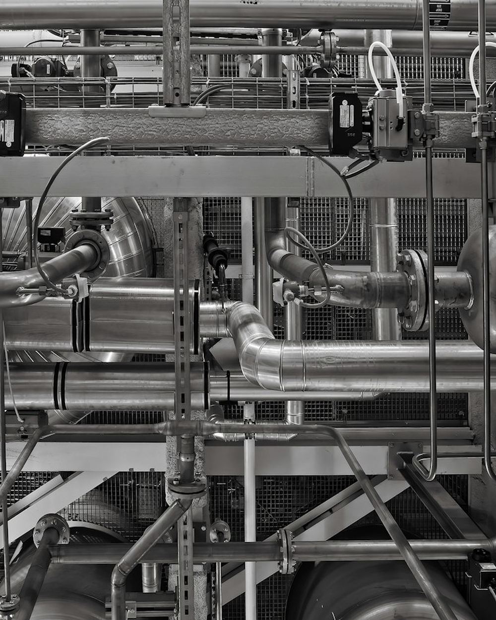 Industrial pipes and valves inside a plant