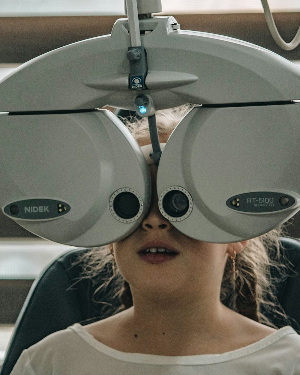 An eye exam with a phoropter